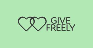 Two interlocking hearts with the words 'Give Freely' on a green background.